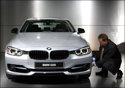 A man checks the new BMW 335i sport line