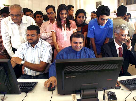 Stockbrokers trade at their terminals during the Diwali special trading session.