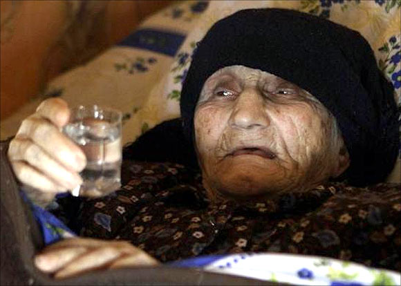Antisa Khvichava, 129 years old, rests at her home in the village of Sachino, west of Tbilisi.