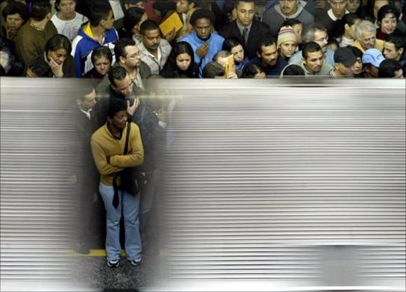 Hundreds of commuters pack the Se central subway station during rush hour in Sao Paulo.