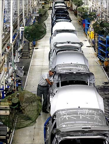 Maruti Suzuki won't start production until workers sign bond