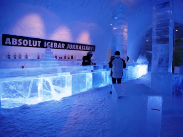 A bartender mixes a drink in the bar of the Ice Hotel in Jukkasjarvi, northern Sweden.