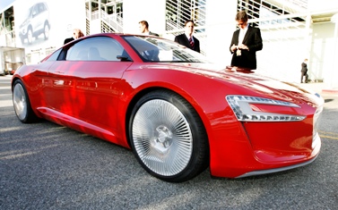 An Audi E-tron electric concept car alternative fuel vehicle is seen on display during a preview.
