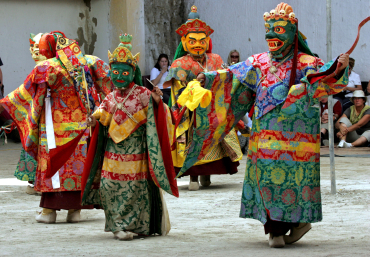 Buddhist monks perform 'chams', or a mask dance, during the Ladakh festival in Phyang west of Leh.