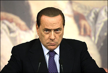 Italian Prime Minister Silvio Berlusconi attends a news conference at Chigi palace in Rome.