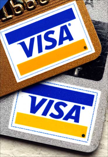 Gold and platinum Visa cards are displayed in New York.