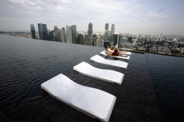 A view of the infinity pool of the Skypark that tops the Marina Bay Sands hotel towers.