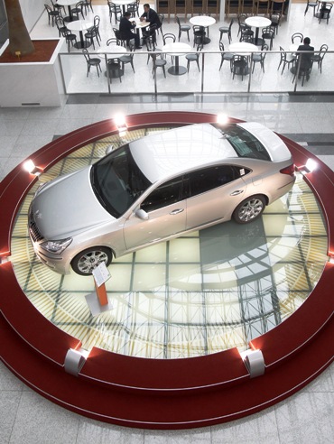 A car is displayed at a headquarters of the Hyundai Kia Automotive Group in Seoul.