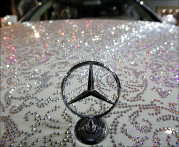 A Mecerdes Benz studded with crystal stones is seen at the Millionaire Fair of luxury goods in Moscow.