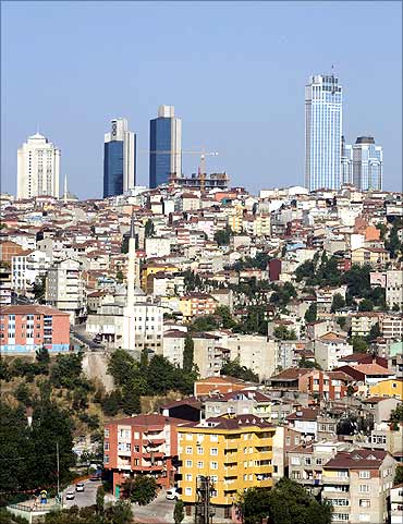 Skyscrapers in the city's business district shape the skyline over Gultepe district in Istanbul.