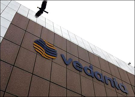 A bird flies by the Vedanta office building in Mumbai.