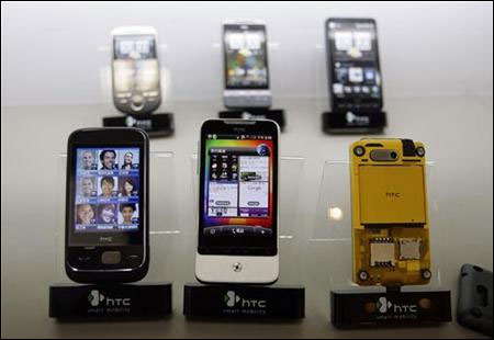 Smartphones are displayed in a mobile phone store in Taipei.