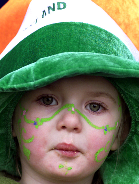 A young parade-goer celebrating St Patrick's Day in Dublin.