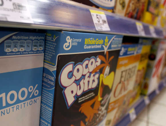 General Mills cereals are displayed on a market's shelf in New York.