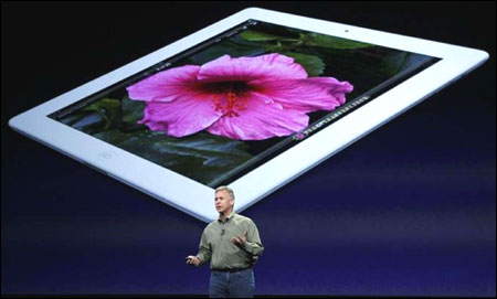 Apple marketing chief Phil Schiller speaks during an Apple event in San Francisco, California on March 7, 2012.