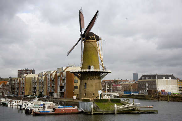 The Distilleerketel, a windmill built in 1727 and used to grind rye, can be seen at Delfshaven, an area of Rotterdam, the Netherlands.
