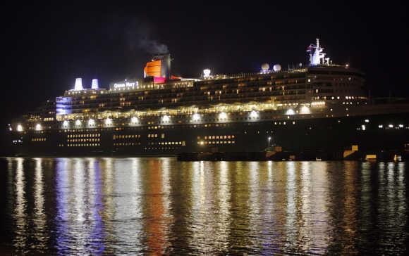 The world's largest ocean liner Queen Mary 2 arrives at a jetty in Port Klang, outside Kuala Lumpur.