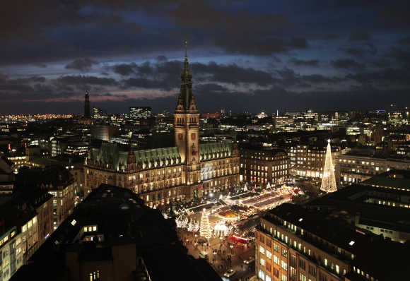 General view of inner city town hall and Christmas market in Hamburg.