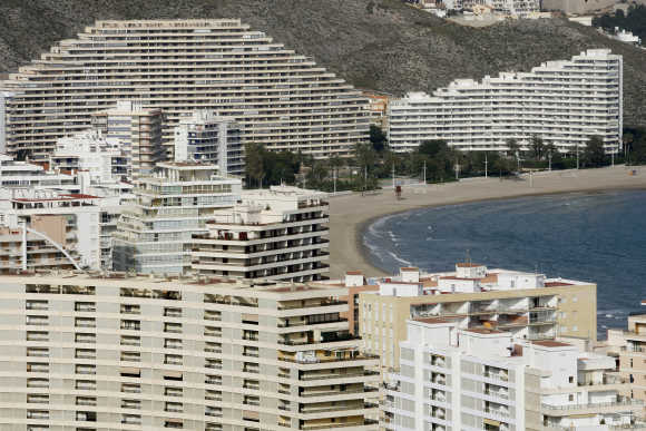 Buildings line up at the beach of Cullera near Valencia.