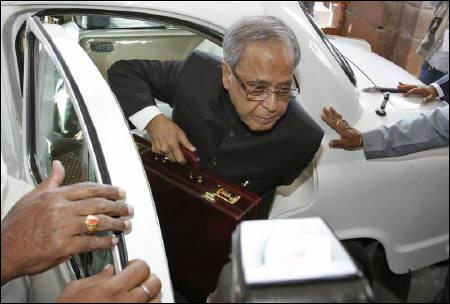 Finance Minister Pranab Mukherjee arrives at the parliament to present the Budget.