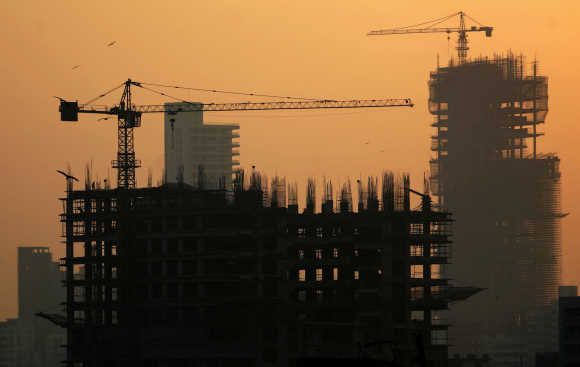 Buildings under construction are seen along the Mumbai skyline.