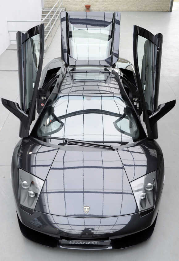 A Lamborghini Murcielago car is displayed in the showroom in downtown Milan.