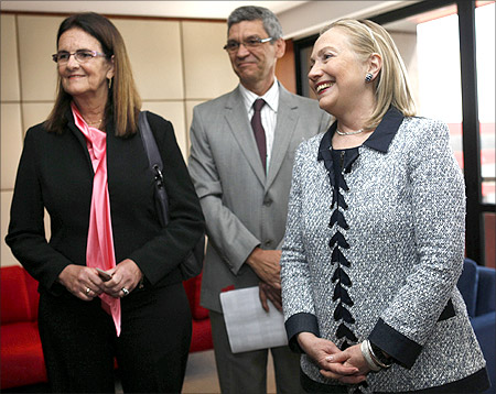 -U.S. Secretary of State Hillary Clinton (R) meets with the CEO of Brazil's state oil company Petroleo Brasileiro Maria das Gracas Silva Foster (L) in Brasilia.