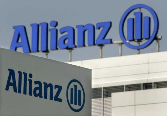 Allianz logos are pictured in front of the headquarter of German insurer Allianz AG in Munich.