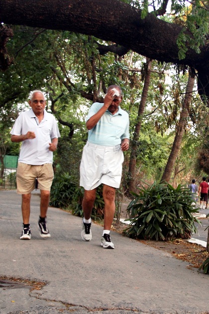 Joggers sweat it out at a Kolkata park.