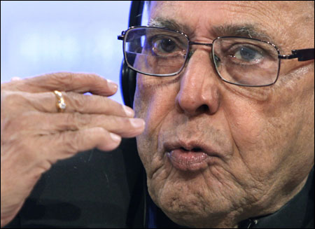 Finance Minister Pranab Mukherjee speaks at a news conference during the spring International Monetary Fund-World Bank meetings in Washington on April 19, 2012.