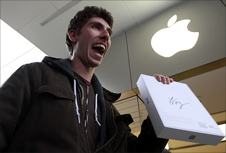 Goran Marberg holds his new iPad, autographed by Apple co-founder Steve Wozniak.