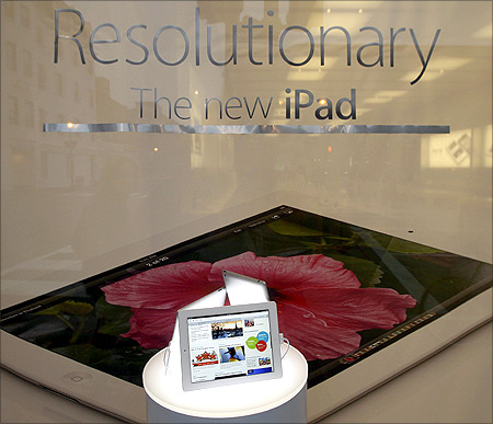 An Apple iPad is pictured in a display window at the Apple Store in Washington.