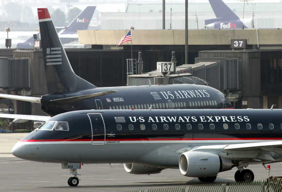 A US Airways Express regional jet departs Terminal A of Newark Liberty International Airport in New Jersey.