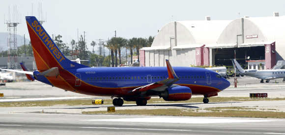 A Southwest Airlines 737-700 taxis at Bob Hope Airport in Burbank, California.