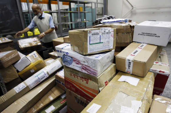 A worker sorts parcels in Turkish Post's postal logistic centre at the Ataturk International airport in Istanbul.