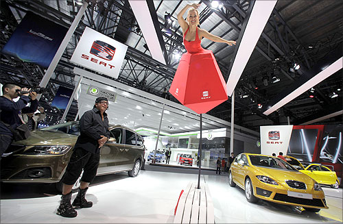 A model performs at a SEAT booth at Auto China 2012 in Beijing.