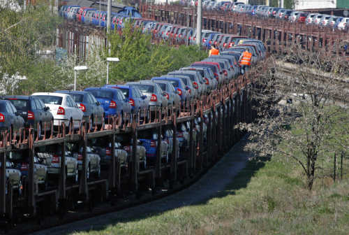 Employees examine cars loaded on a train at the Skoda Auto factory in Mlada Boleslav, 40km northeast of Prague.