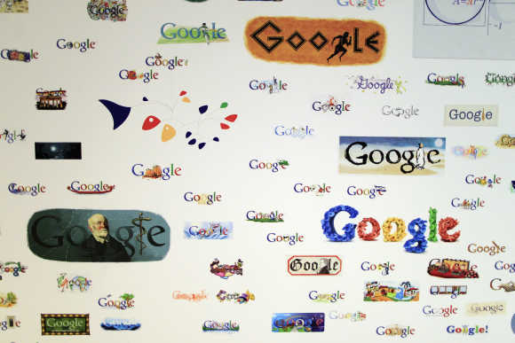 Google homepage logos are seen on a wall at its campus near Venice Beach in Los Angeles.