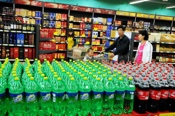 People purchase goods at a supermarket in Lianyungang, Jinagsu Province of China.