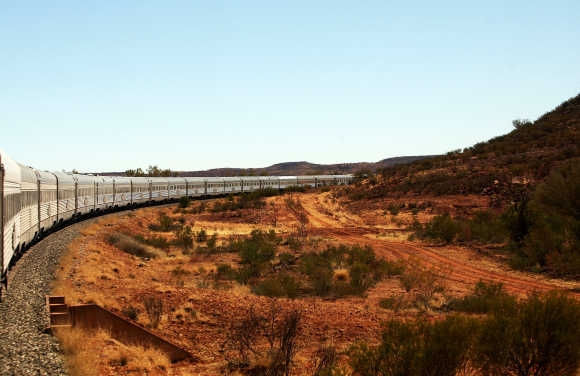 The Ghan winds it's way through the outback in Australia.