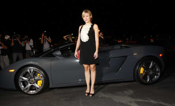 Actress Kristen Bell arrives at the grand opening of Lamborghini Calabasas in Calabasas, California.