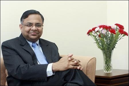 N Chandrasekaran poses in this undated handout photograph taken inside his office in Mumbai.