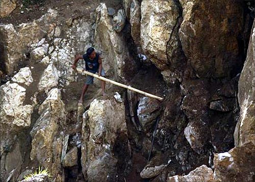 Searching for gold in Indonesia's hills