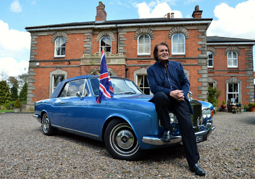 Englebert Humperdinck poses at his home for photographs next to his Rolls Royce
