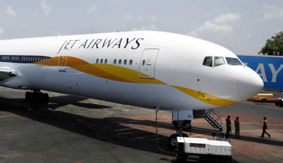 A Jet Airways Boeing 777-300ER aircraft sits on the tarmac at Mumbai airport.