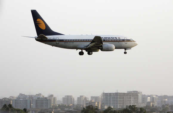 A Jet Airways plane prepares to land at Mumbai airport.