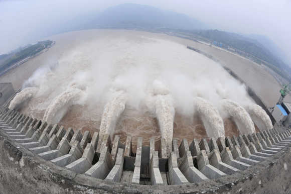 The Three Gorges Dam Project discharges flood water to lower the water level in the reservoir in Yichang, China.