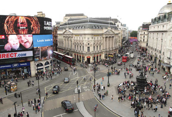 Piccadilly Circus at rush hour in central London.