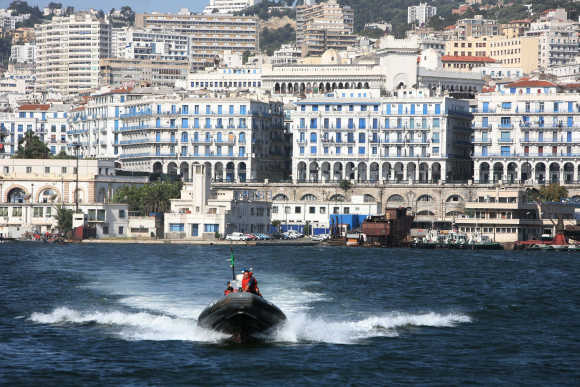 Algerian coastguards cross the bay of the Mediterranean port of Algiers.