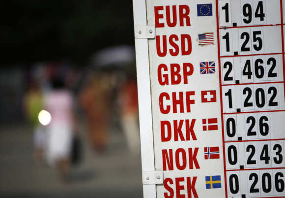 A board showing foreign currency exchange rates is displayed in Varna, 450km northeast of Bulgarian capital Sofia.